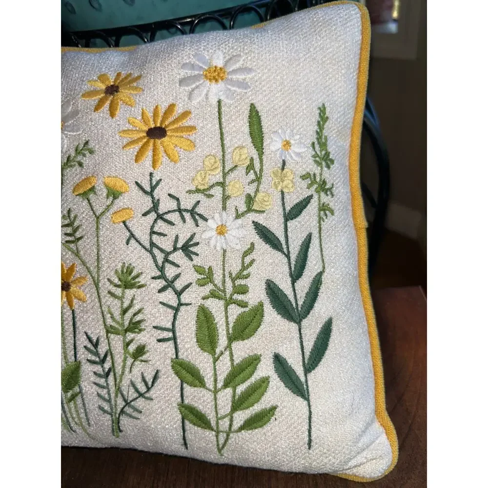 Floral embroidered throw pillow yellow flowers